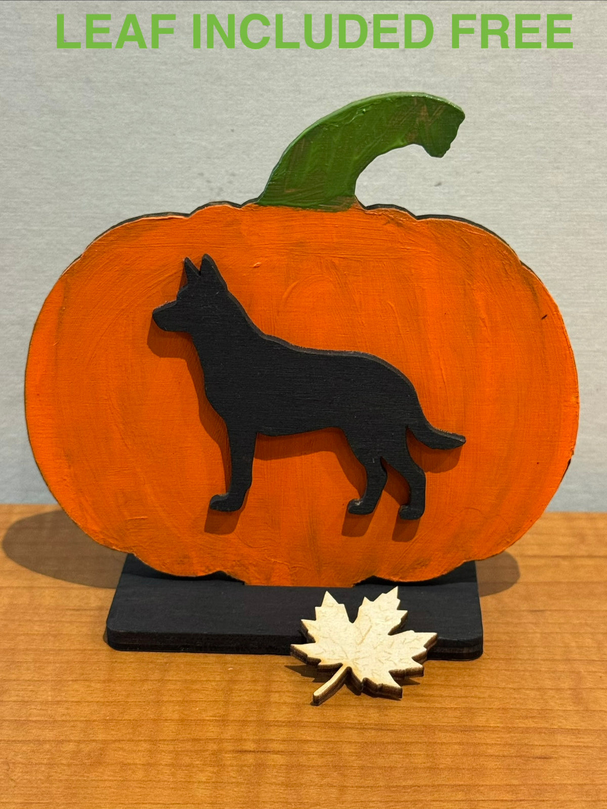Finished German Shepherd pumpkin display with a decorative leaf included free