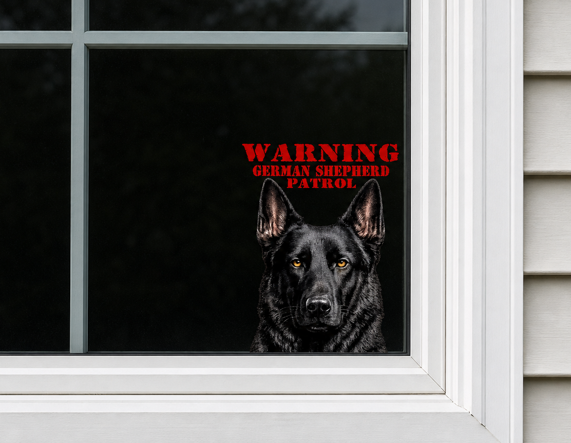 WARNING German Shepherd Patrol UV decal applied to exterior of home window — black GSD security sticker designed to deter intruders by GSDUSA