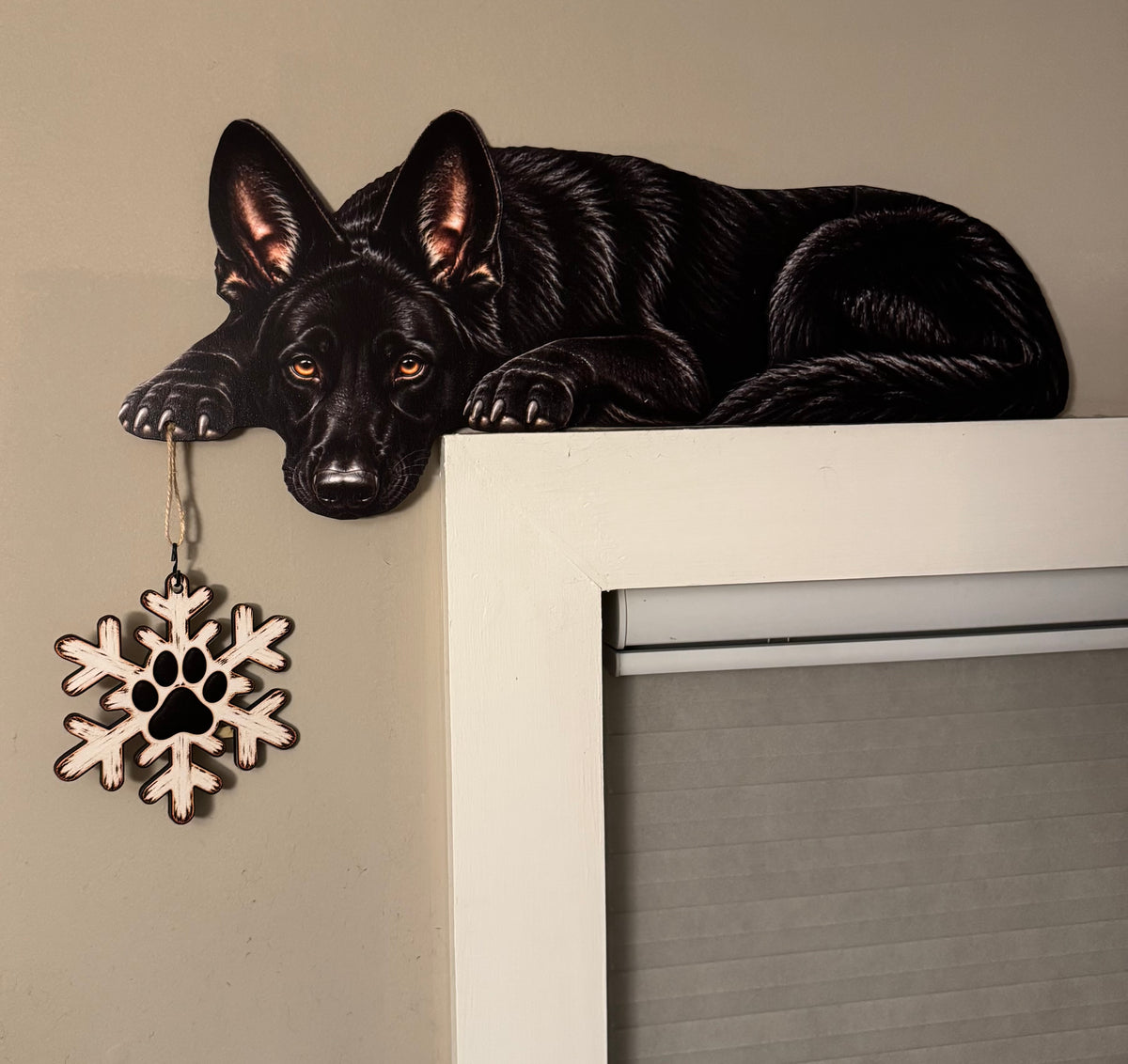 Black German Shepherd door topper above a window with hanging charm