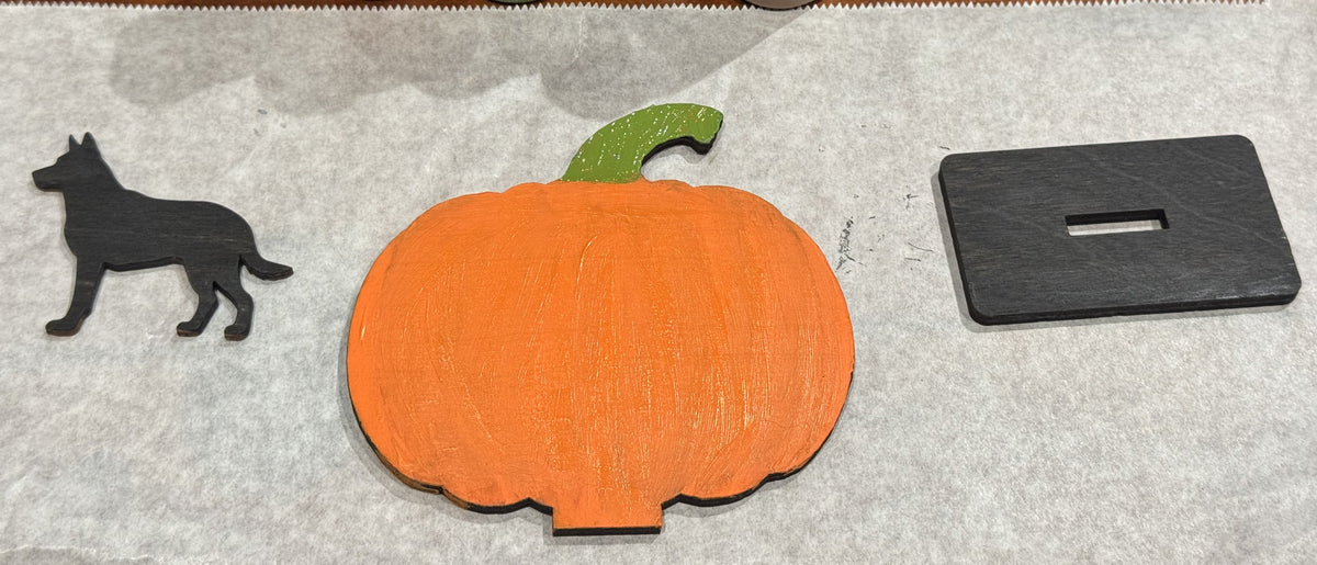 Unfinished pumpkin blank, German Shepherd silhouette, and display stand shown as separate pieces